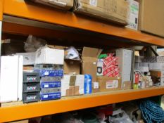 A large quantity of electrical equipment to include sockets/switches, fuse boxes and other related