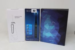 A Fairywill Sonic toothbrush, a Sboly 2 Sonic electric toothbrush and a Esseason cordless oral