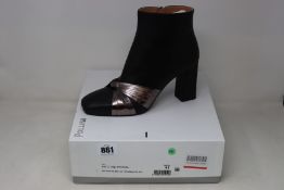 A pair of as new Pollini soft leather ankle boots (Soles show they may have been worn to try but