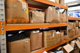 Nine boxes of assorted clothing and related items.