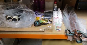 A quantity of house pet and horse related items to include: dressage markers, shampoos and hygiene