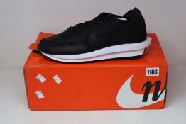 A pair of as new Nike LD Waffle Sacai trainers in black (UK 13 - Damaged box).