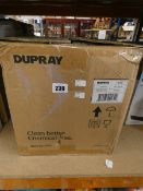 A boxed Dupray NEAT multi-purpose steam cleaner.