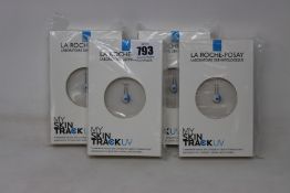 Four boxed as new La Roche-Posay My Skin Track UV wearable sensors.