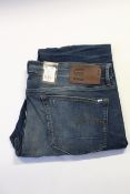 Four pairs of as new G Star Raw jeans (W27/L28, W30/L32, W32/L28, W40/L34).