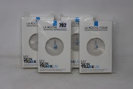 Four boxed as new La Roche-Posay My Skin Track UV wearable sensors.