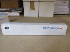 A boxed Dormakaba concealed fire door closer (PN: ITS 96).