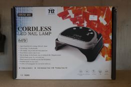 A boxed as new 64W cordless rechargeable LED nail lamp light gel polish nail dryer timer beauty.