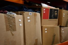 A quantity of assorted as new clothing and related items.