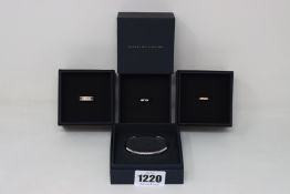 Four as new Daniel Wellington rings together with a Daniel Wellington bracelet.