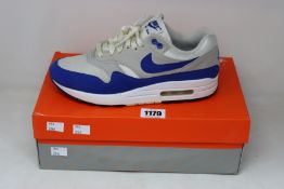 A pair of pre-owned Nike Air Max 1 Anniversary trainers (UK 7, Good condition).