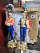 Two Bruno Merli designed soldier figurines (One in good condition, one with separated head, but