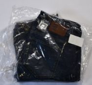 Four pairs of as new G-Star Raw jeans (W24/L30, 3 x W26 L 2 x 30, 1 x 32).