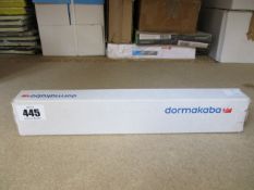 A boxed Dormakaba concealed fire door closer (PN: ITS 96).