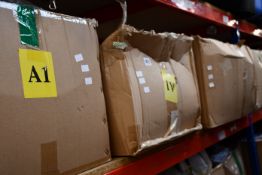 Four boxes of assorted as new clothing and related items.