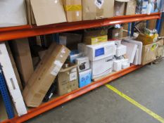 A shelf of electrical items to include UV sanitizers attachable fans, weather station and desk round