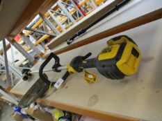 A pre-owned DeWalt DCM561 18V XR Brushless 5.0AH String Trimmer (No battery).