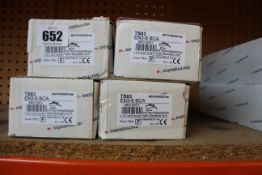 Four boxed Dormakaba TS83 Size 3-6 overhead door closers.