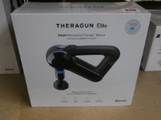 A boxed as new Theragun Elite smart deep tissue massage device.