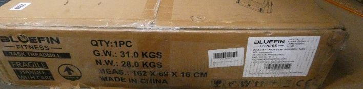 A boxed as new Bluefin Fitness Task Treadmill.