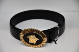 An as new Versace oval medallion leather belt (Size 90 - RRP £350).
