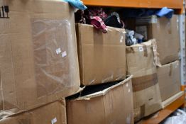 Eight boxes of assorted clothing and related items.