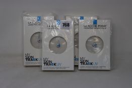 Four boxed as new La Roche-Posay My Skin Track UV wearable sensors.