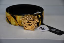 An as new Versace Gold Hibiscus print Plazzo belt (Size 95 - RRP £370).