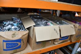 Four boxes of assorted as new phone cases and wallets (Approximately 1750 items).