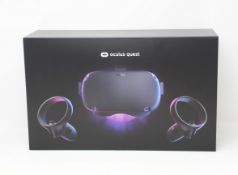 An Oculus Quest 64GB All-in-One VR Headset (Box opened, appears as new).