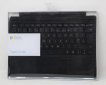 A boxed as new Microsoft Surface Pro Type Cover in Black (FMM-0003 1725) (Box sealed).