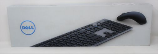 A boxed as new Dell Premier Wireless Keyboard and Mouse (P/N: KM717 - UK QWERTY) (Box sealed).