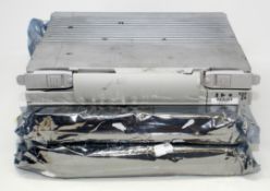 A pre-owned Nortel Optera NTCA04KP WMR3F1AAD 1552 .52NM OC-192 STM-64 XR and two pre-owned Nortel