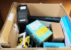 COLLECTION ONLY: A box of assorted as new small electrical items and accessories.