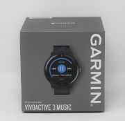 A boxed as new Garmin Vivoactive 3 Music Fitness Smartwatch in Black (Box sealed).