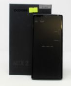A boxed as new Doogee Mix 2 128GB Smartphone in Ceramic Black (Box opened, UK plug adaptor