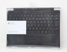 A boxed as new Microsoft Surface Pro Type Cover in Black (FMM-0003 1725) (Box sealed).