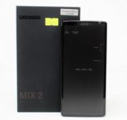 A boxed as new Doogee Mix 2 64GB Smartphone in Ceramic Black (Box opened, UK plug adaptor
