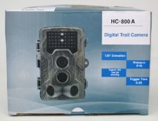 A boxed as new HC-800A Digital Trail Camera (Box opened, some damage to box).