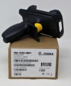 A boxed as new Zebra TRG-TC2X-SNP1-01 Snap On Trigger Handle.