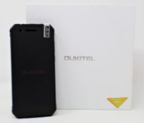 A boxed as new Oukitel WP1 64GB Rugged Smartphone in Black (Box opened, UK plug adaptor required) (