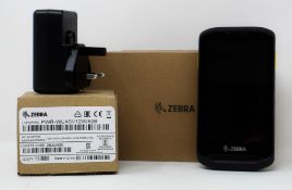 A boxed as new Zebra TC200J-10C112A6 Handheld Computer Barcode Scanner and a boxed as new Zebra