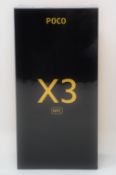 A boxed as new Xiaomi Poco X3 NFC 128GB Smartphone in Shadow Gray (UK plug adaptor required) (Box