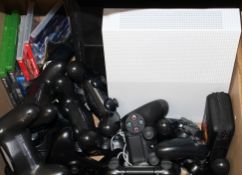 COLLECTION ONLY: A box of assorted pre-owned games consoles, games and controllers (All items
