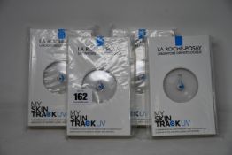 Four boxed as new La Roche-Posay My Skin Track UV wearable sensors.