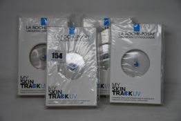 Four boxed as new La Roche-Posay My Skin Track UV wearable sensors.
