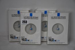 Four boxed as new La Roche-Posay My Skin Track UV wearable sensors.