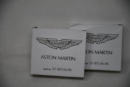 Two boxes of four as new Aston Martin spark plugs 07-85126-PK.