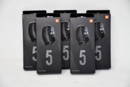Five boxed as new Xiaomi Mi Smart Band 5 Fitness Trackers in black.