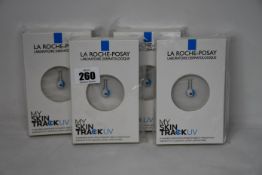 Four boxed as new La Roche-Posay My Skin Track UV wearable sensors.